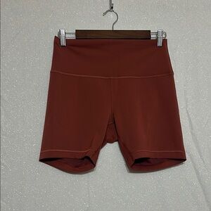 Burnt Orange Lululemon Wunder Train High-Rise 6 inch shorts. Size 10